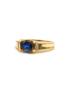 Bague contemporaine en or jaune 18 carats sertie d'un saphir et de diamants "taille" brillant (+-0.028ct) - - 2