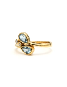 Bague contemporaine en or jaune 18 carats sertie de topazes et de diamants "taille" brillant (+-0.035ct) - - 2