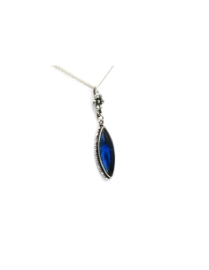 Pendentif Années 50 en argent 925 serti d'une aile de papillon sous cristal