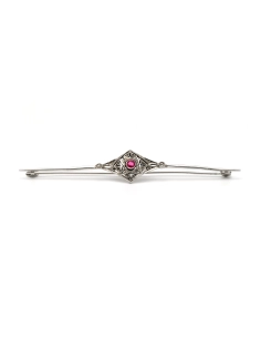 Broche Art Déco en argent 800 sertie d'un rubis et de strass