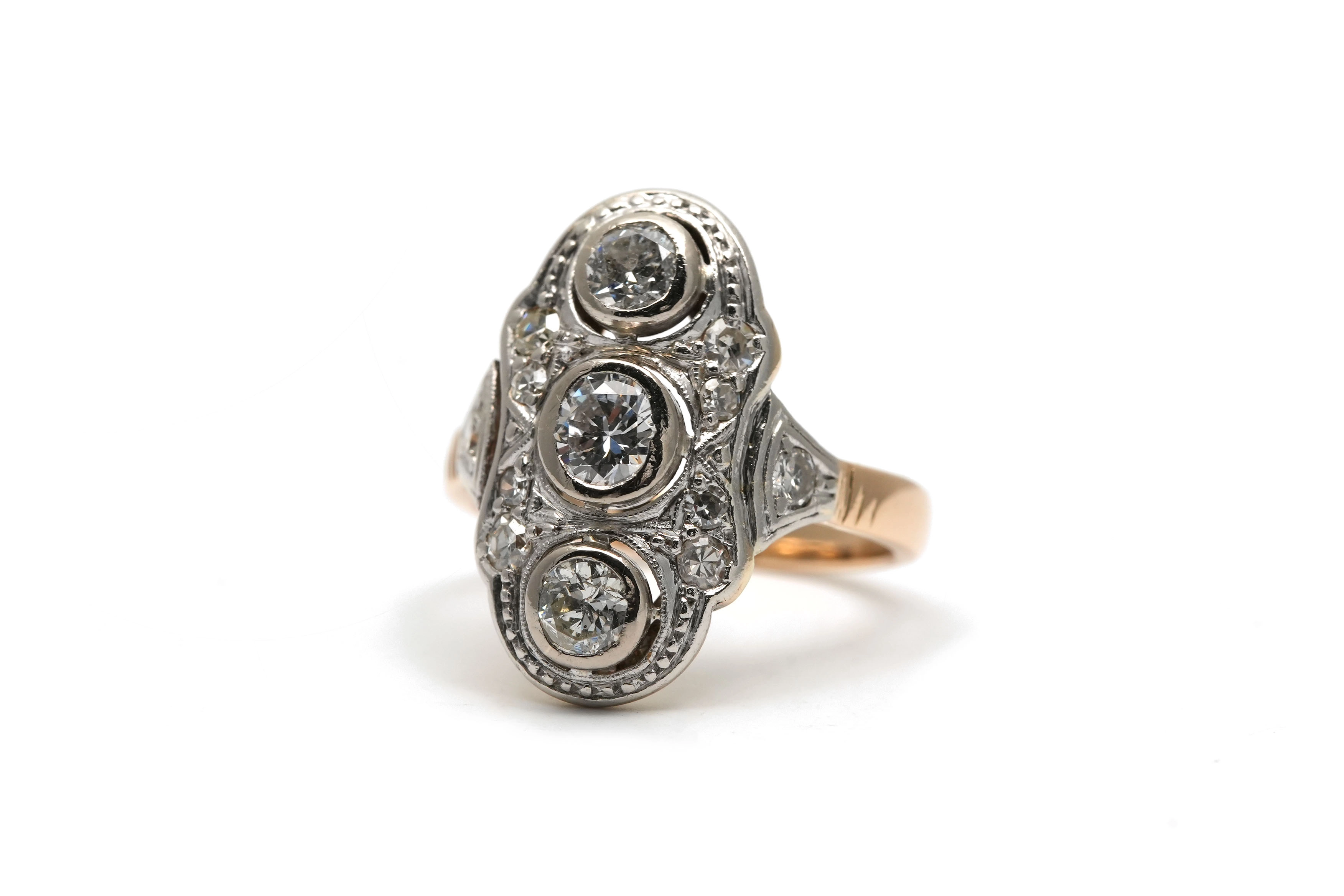 Bague Art Déco en or jaune et blanc 18 carats sertie de diamants taille "brillant" (+-0.55 ct) et taille "8/8"