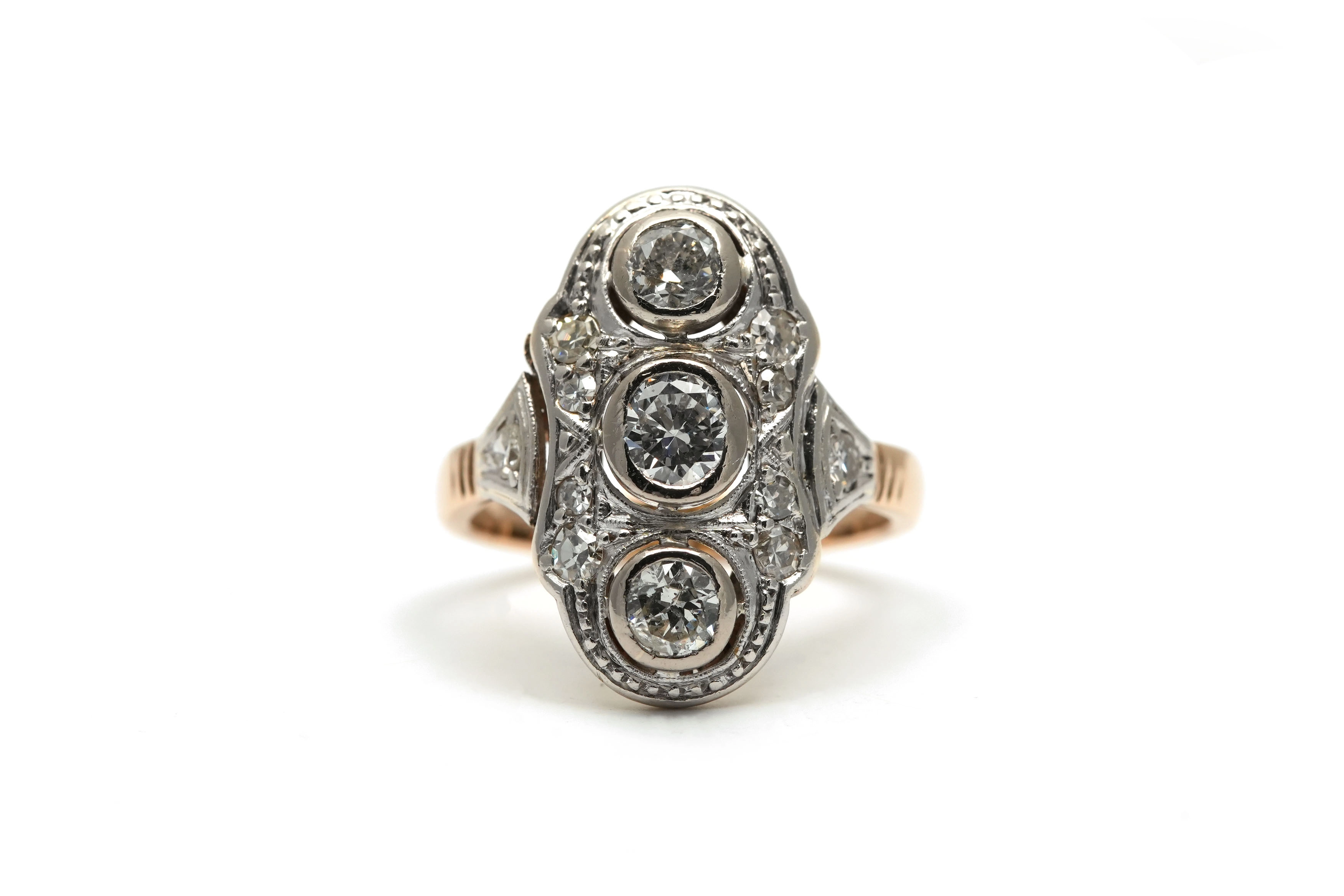 Bague Art Déco en or jaune et blanc 18 carats sertie de diamants taille "brillant" (+-0.55 ct) et taille "8/8"