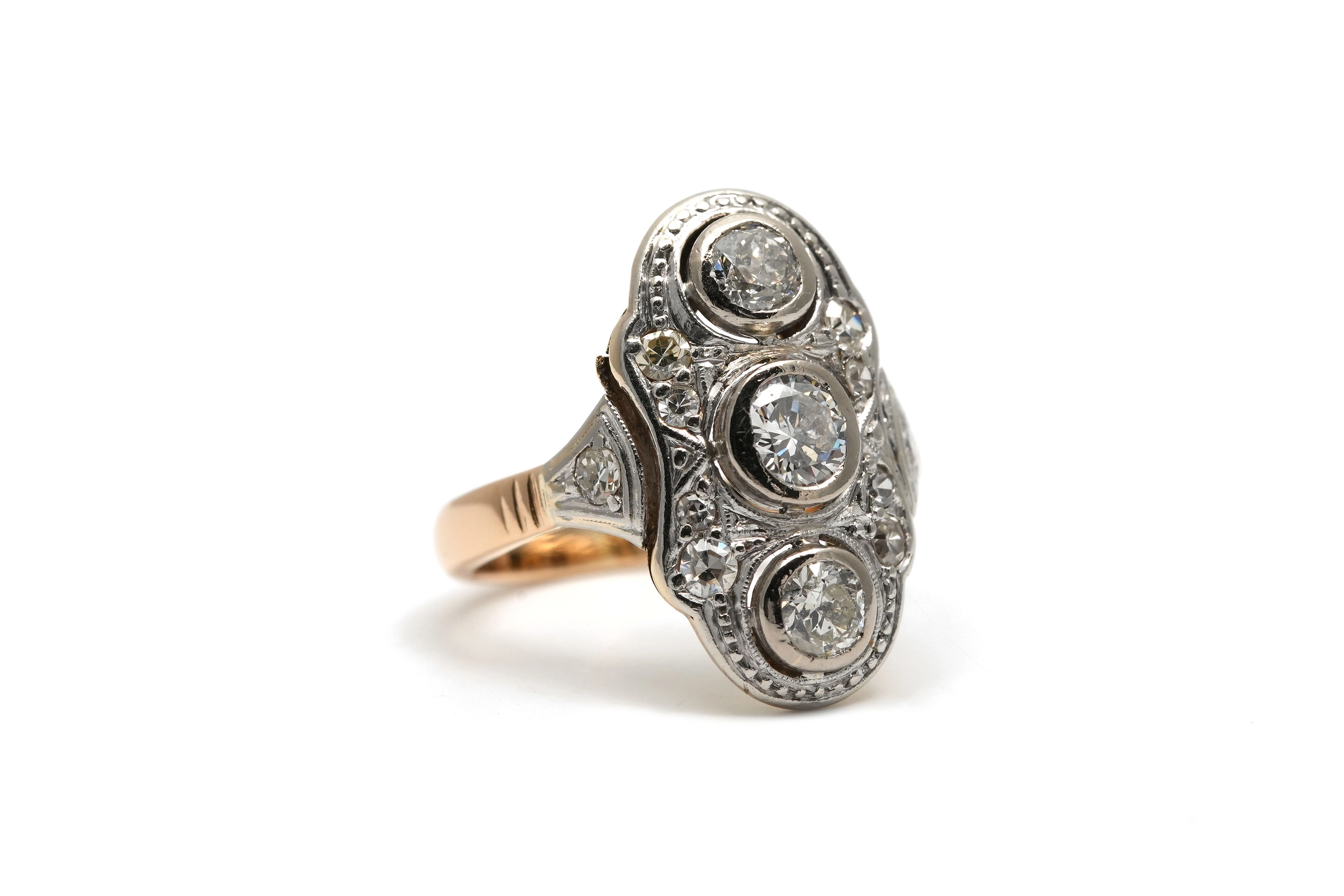 Bague Art Déco en or jaune et blanc 18 carats sertie de diamants taille "brillant" (+-0.55 ct) et taille "8/8"