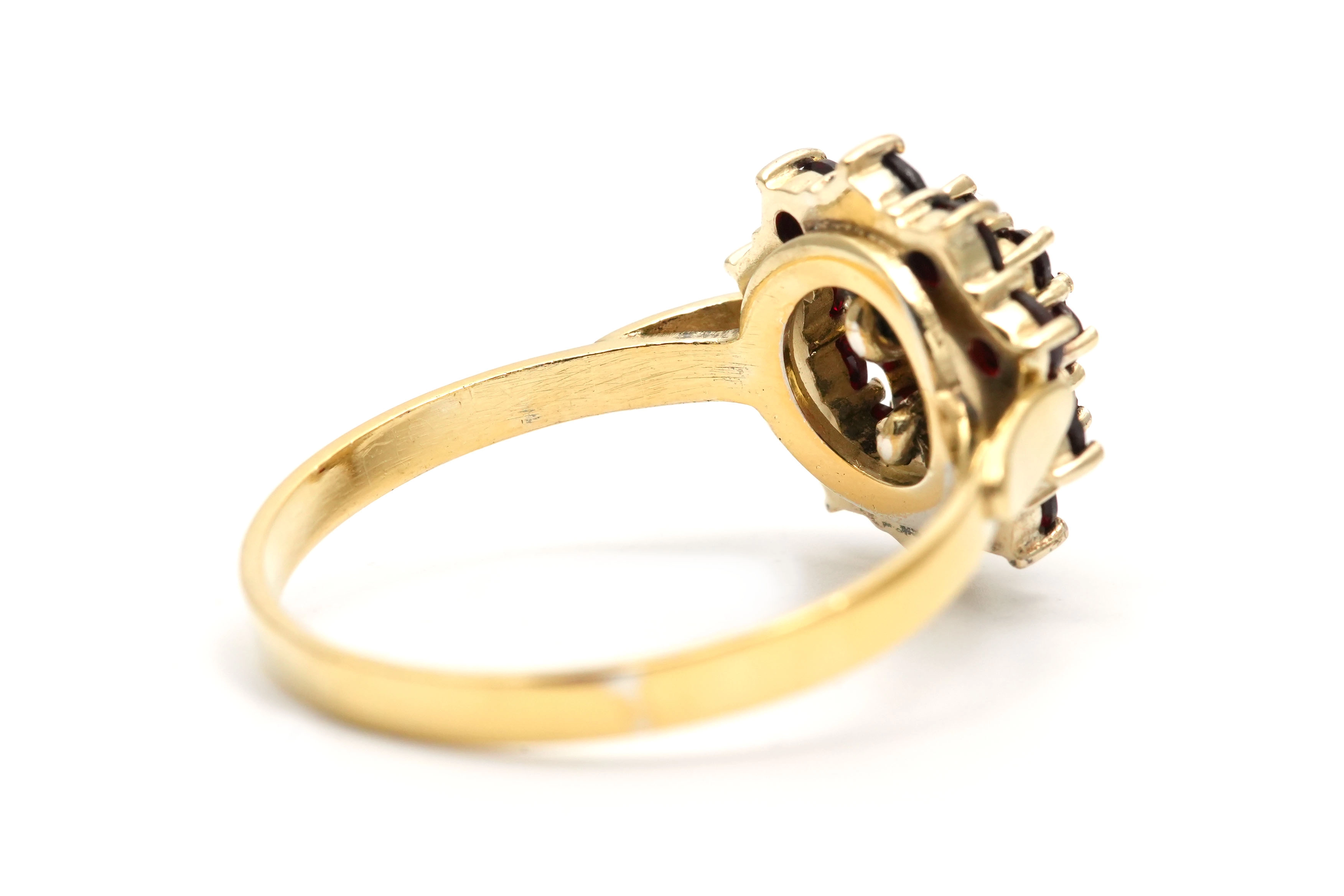 Bague Années 50 en argent 900 (vermeil) serties de grenats
