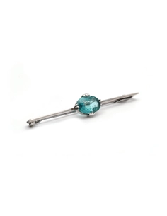 Broche Art Déco en argent sertie d'un cristal