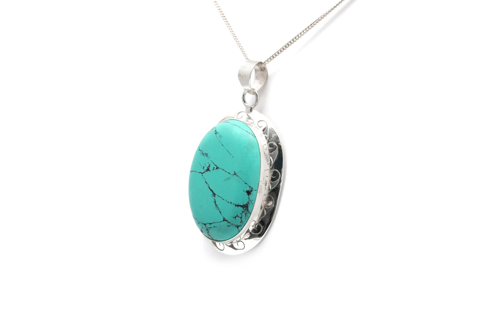 Pendentif contemporain en argent serti d'une turquoise
