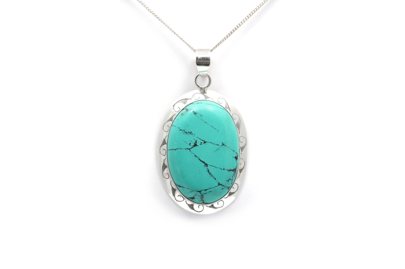 Pendentif contemporain en argent serti d'une turquoise