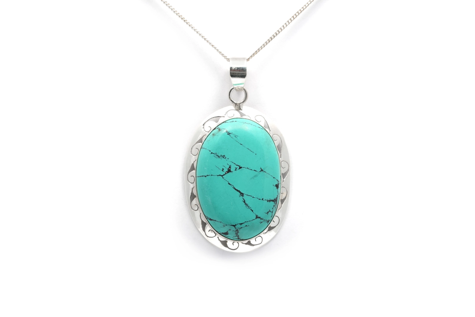 Pendentif contemporain en argent serti d'une turquoise
