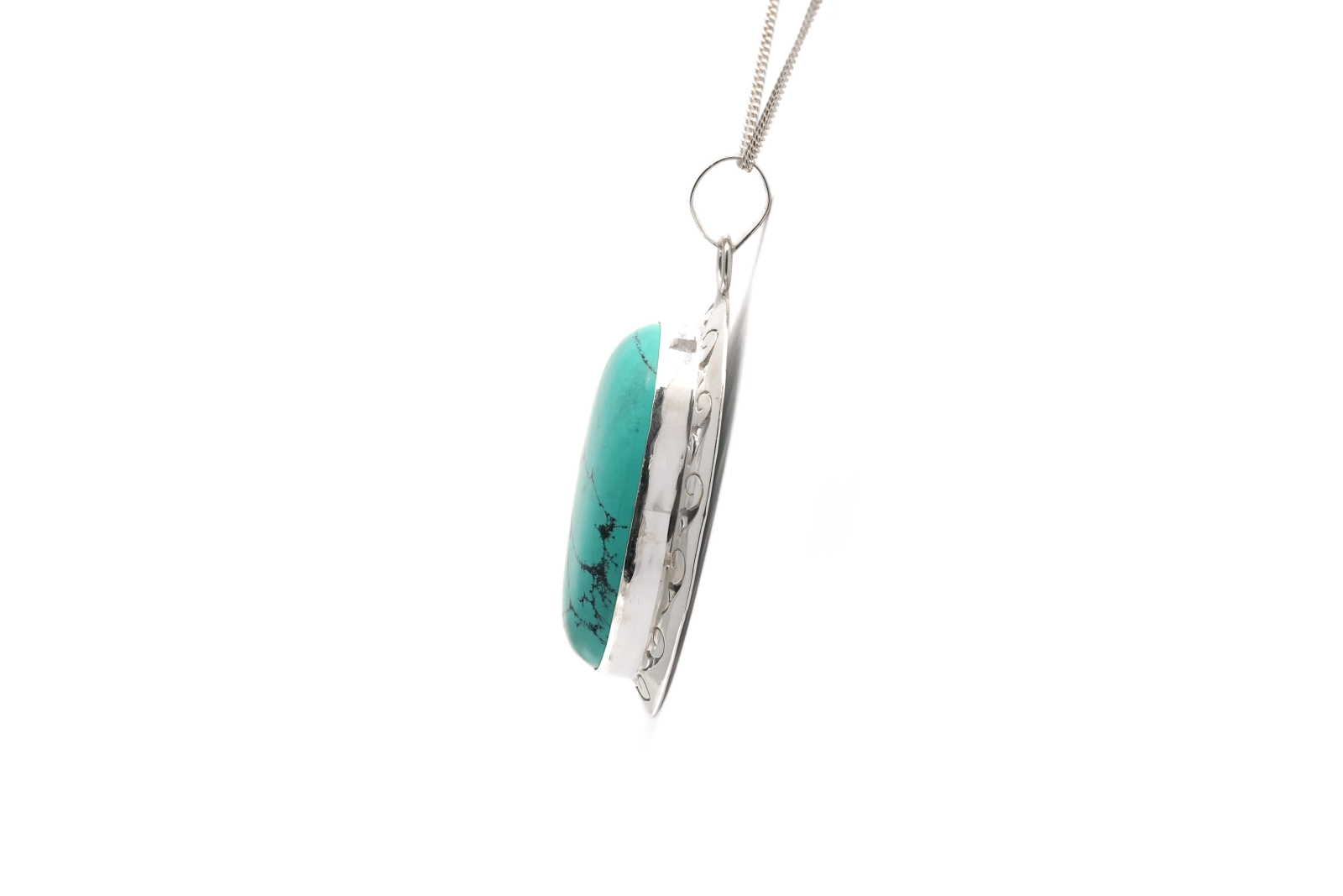 Pendentif contemporain en argent serti d'une turquoise