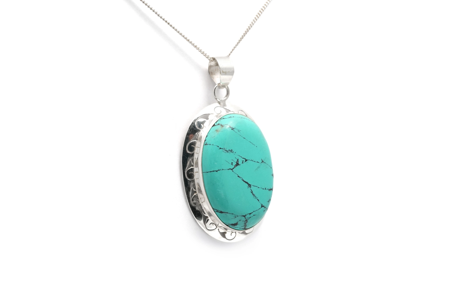 Pendentif contemporain en argent serti d'une turquoise