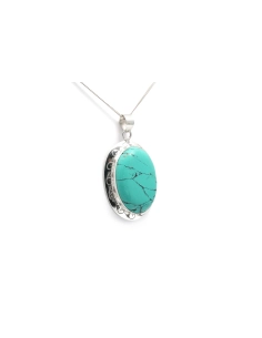 Pendentif contemporain en argent serti d'une turquoise