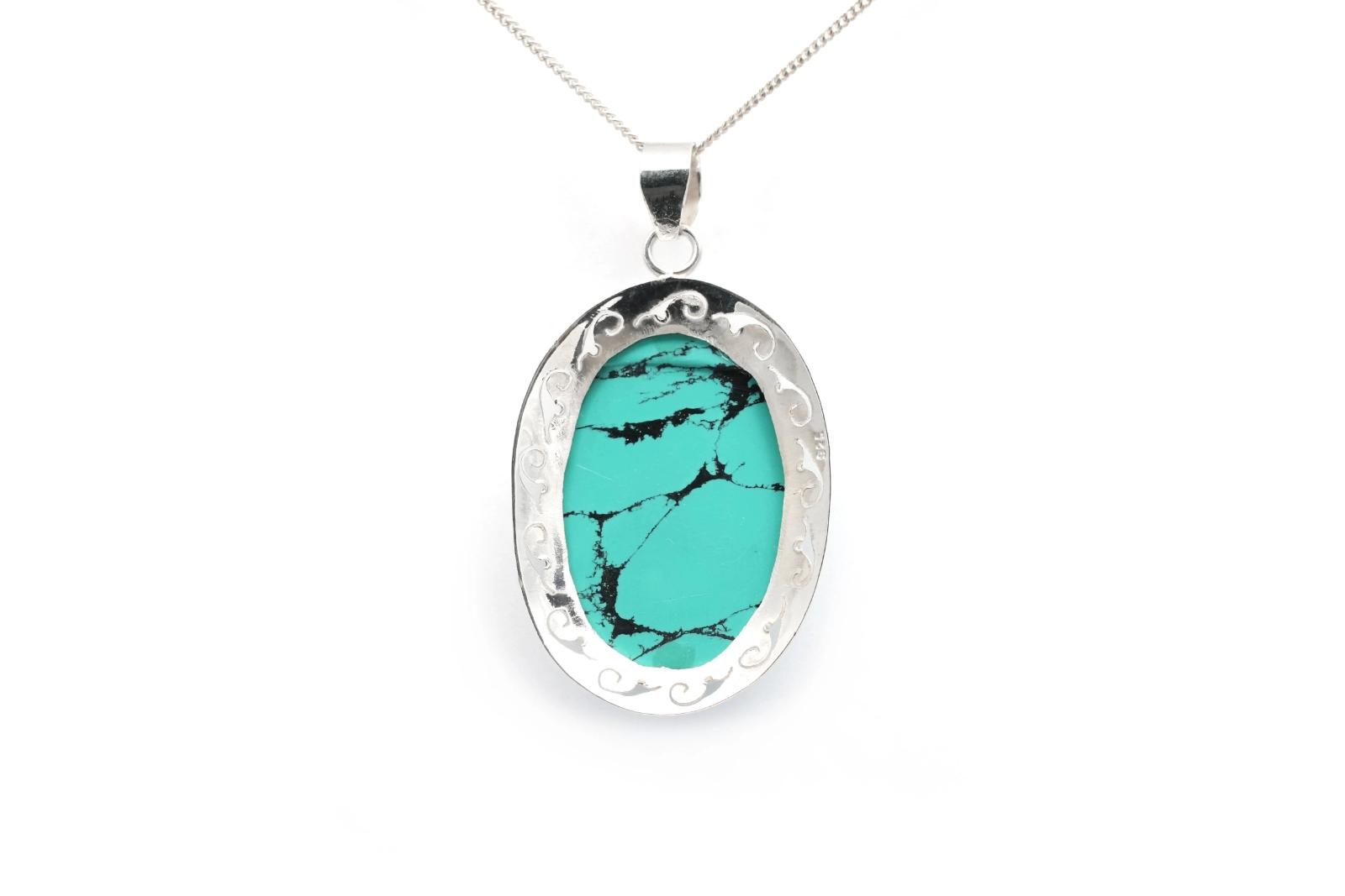 Pendentif contemporain en argent serti d'une turquoise