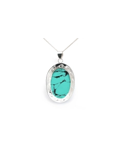 Pendentif contemporain en argent serti d'une turquoise