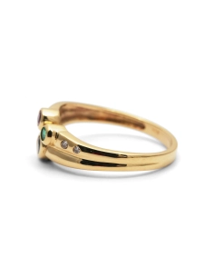 Bague contemporaine en or jaune 18 ct sertie d'une émeraude, un rubis, un saphir et un diamant taille "brillant" (+-0.024ct)