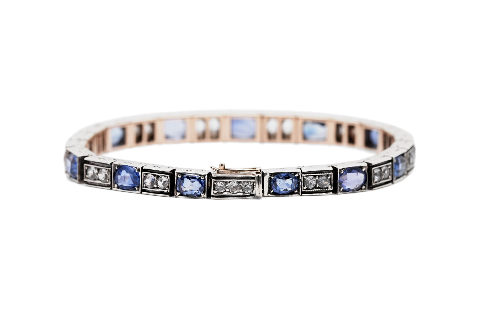 Bracelet Art Déco en or jaune 18 carats et argent serti de saphirs
