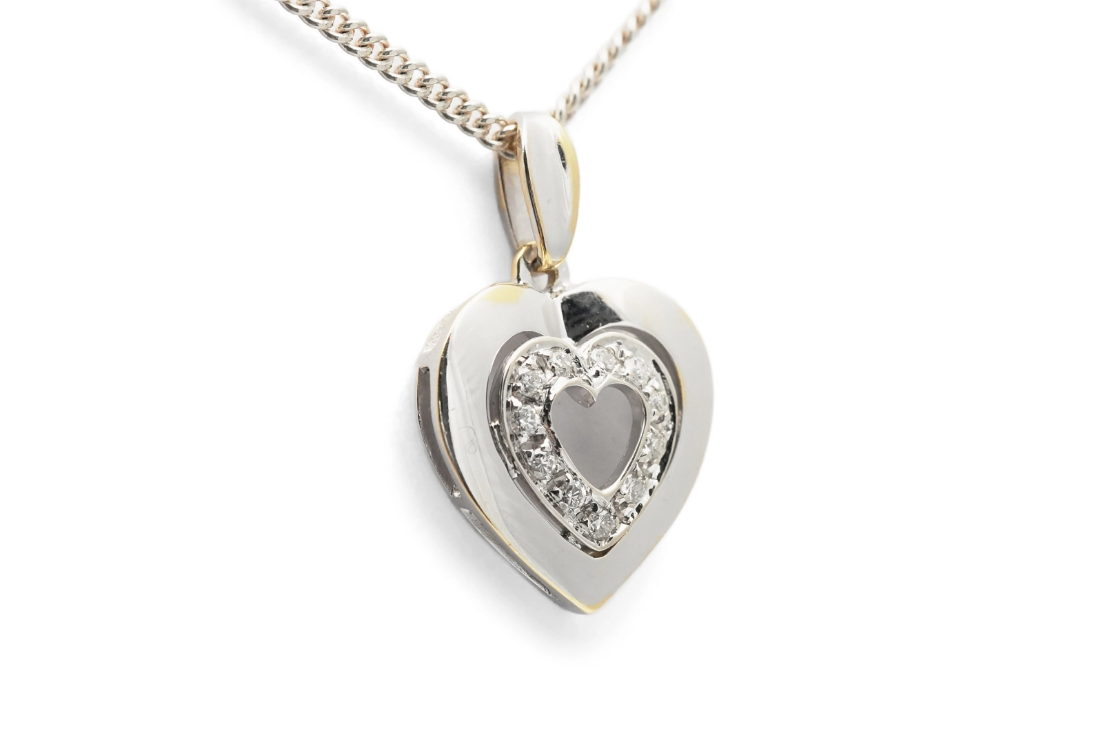 Pendentif cœur contemporain en or blanc 18 carats serti de diamants taille "brillant" (+- 0.12 ct)